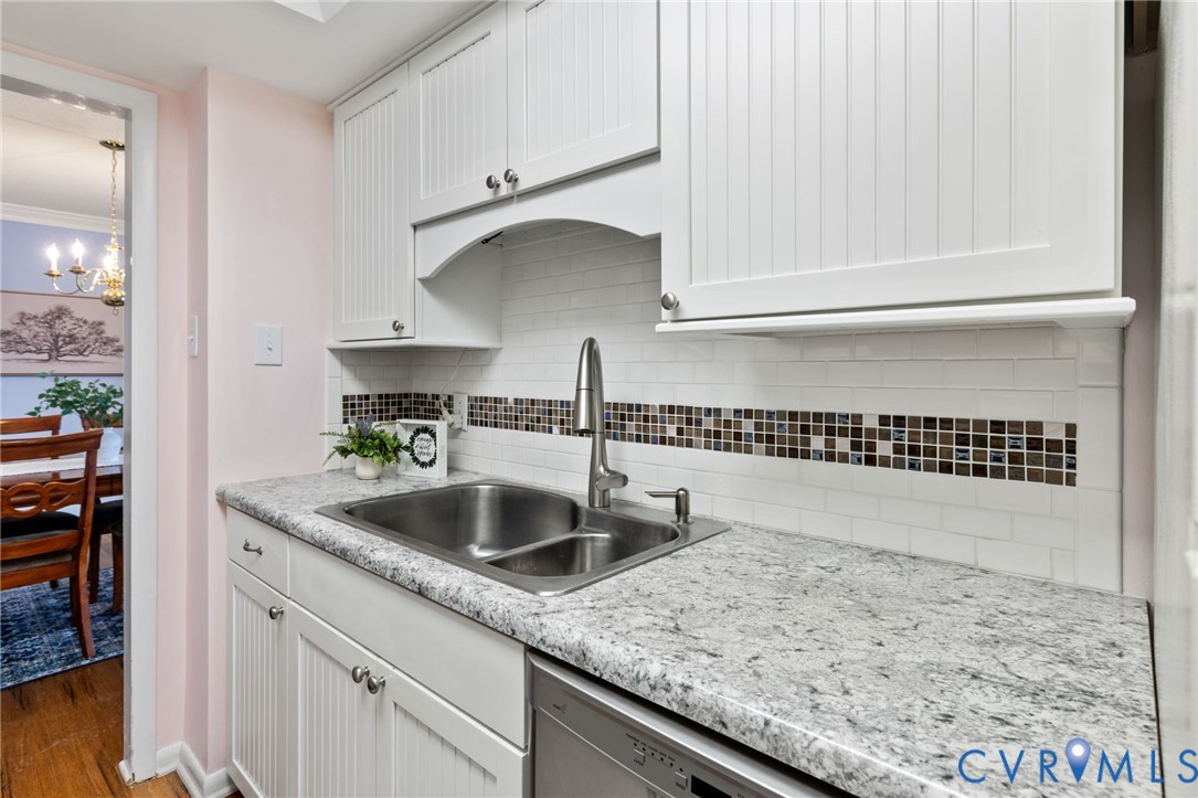 2956 Hathaway Road, Unit 903 Richmond, VA 23225 - Photo 4 of 27 a kitchen with a sink and cabinets