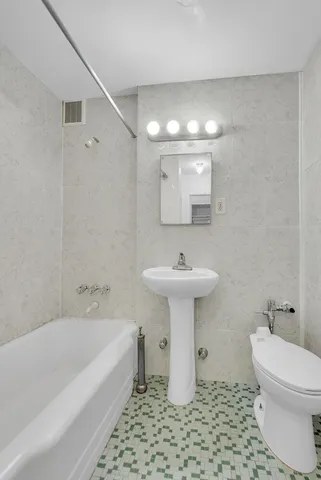 a utility room with washer and dryer