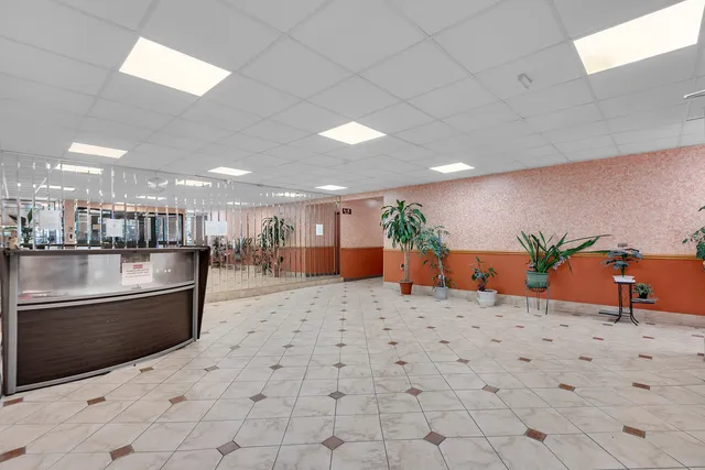 a bathroom with a sink a toilet and bathtub