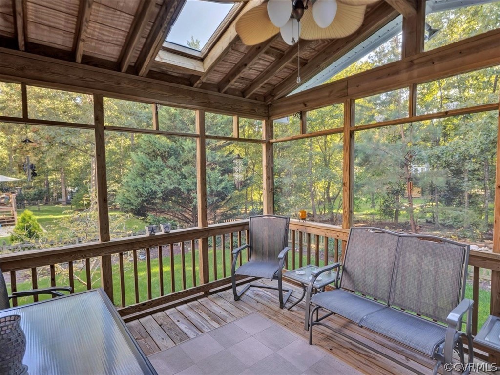 15211 Powell Grove Road Midlothian, VA 23112 - Photo 23 of 34 a view of a porch with furniture and wooden floor