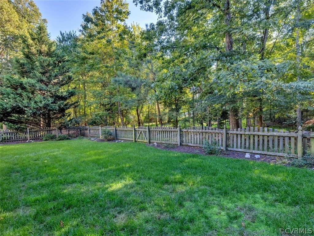 15211 Powell Grove Road Midlothian, VA 23112 - Photo 26 of 34 a view of a deck with a big yard