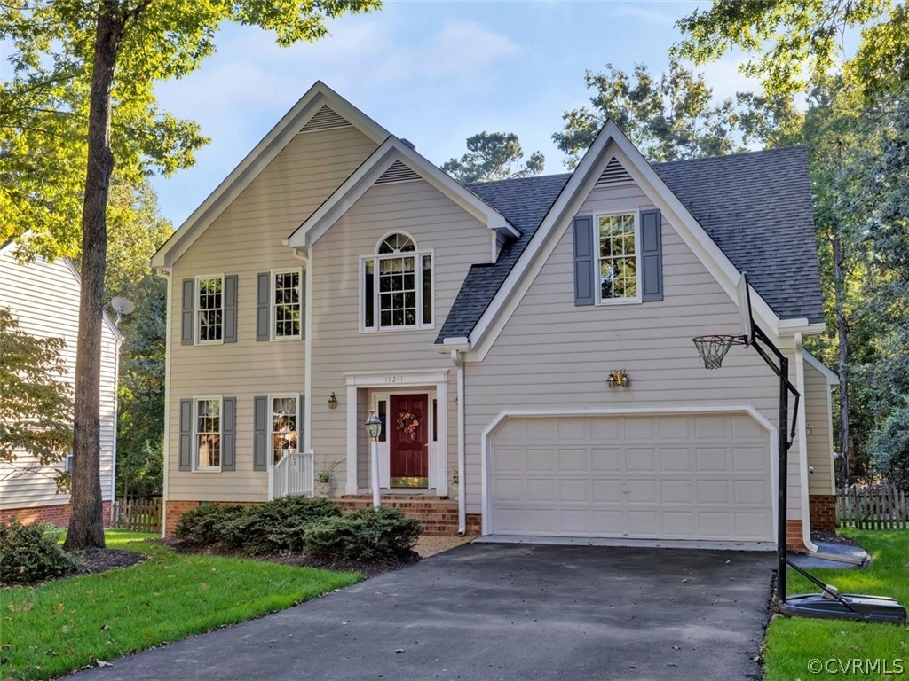 15211 Powell Grove Road Midlothian, VA 23112 - Photo 29 of 34 a front view of a house with a garden
