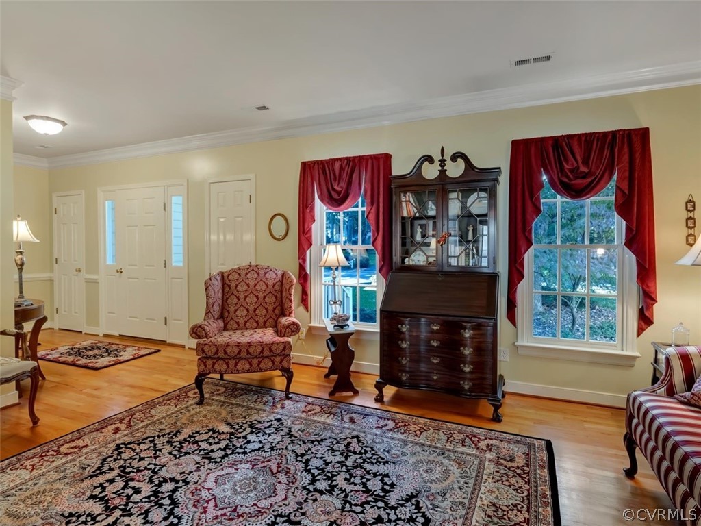 15211 Powell Grove Road Midlothian, VA 23112 - Photo 5 of 34 a living room with furniture and a window