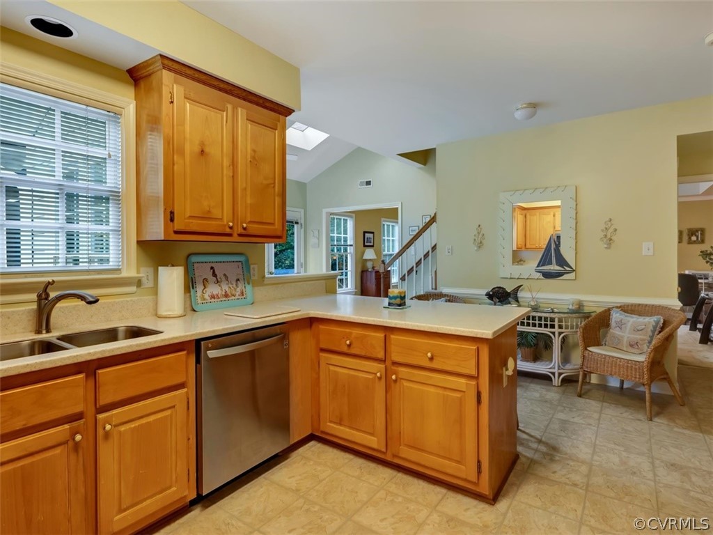 15211 Powell Grove Road Midlothian, VA 23112 - Photo 8 of 34 a kitchen with a sink and cabinets