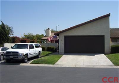 1224 Jamie Loop Santa Maria, CA 93454 - Photo 2 of 14 a front view of a house with a yard