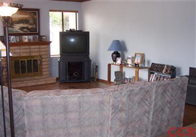 1224 Jamie Loop Santa Maria, CA 93454 - Photo 4 of 14 a living room with furniture and a fireplace