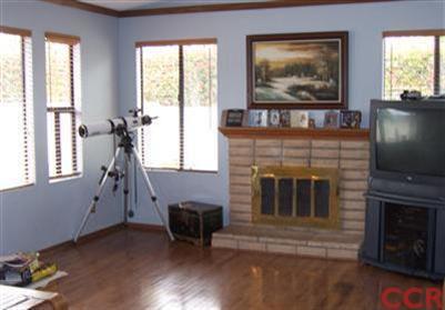 1224 Jamie Loop Santa Maria, CA 93454 - Photo 5 of 14 a living room with furniture and a fireplace