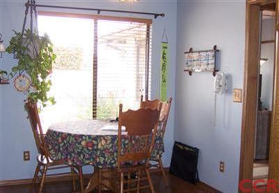 1224 Jamie Loop Santa Maria, CA 93454 - Photo 7 of 14 a view of a dining room with furniture and a window