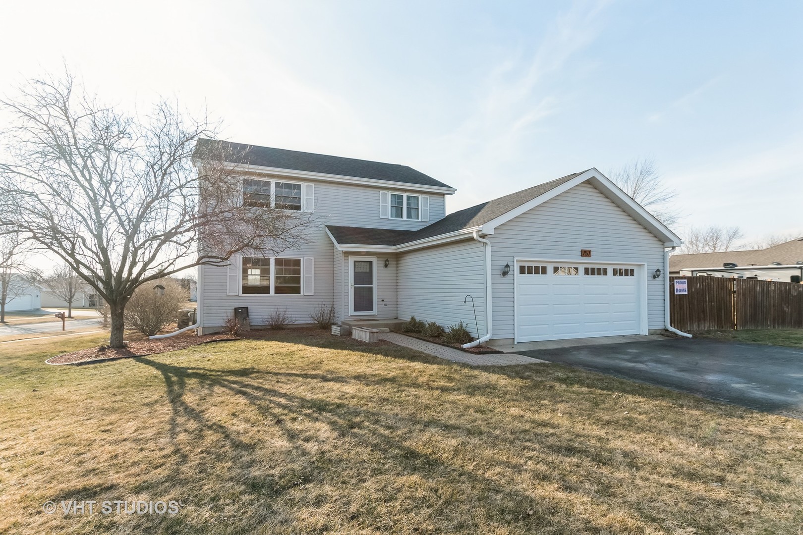 757 Longlane Road New Lenox, IL 60451 - Photo 1 of 16 a view of a house with snow on the side of the road