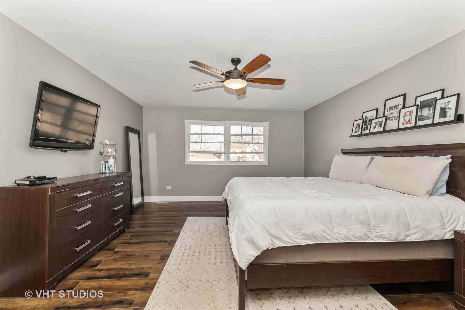 757 Longlane Road New Lenox, IL 60451 - Photo 12 of 16 a bedroom with a bed and a flat screen tv