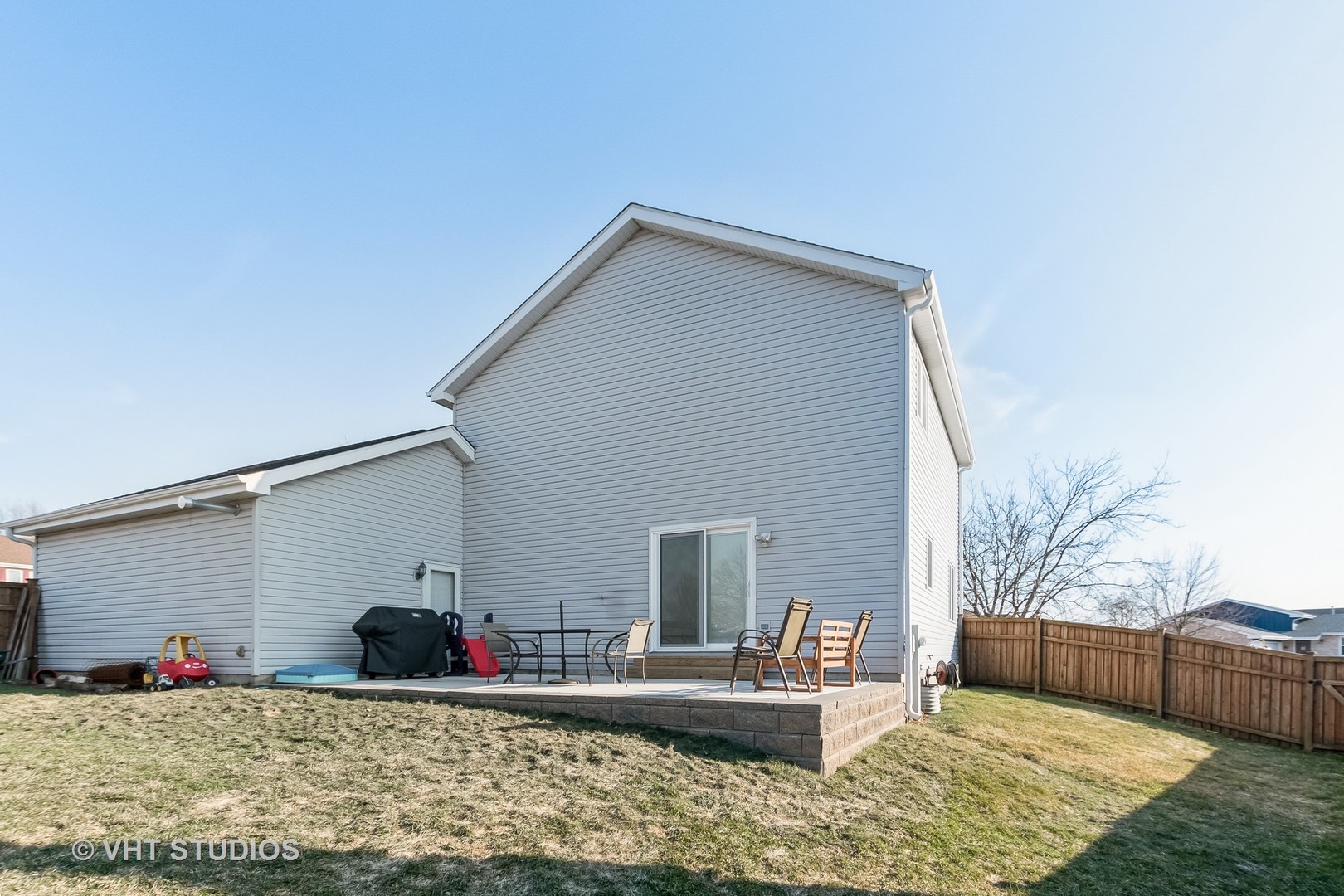 757 Longlane Road New Lenox, IL 60451 - Photo 16 of 16 a view of a house with backyard and trees in the background