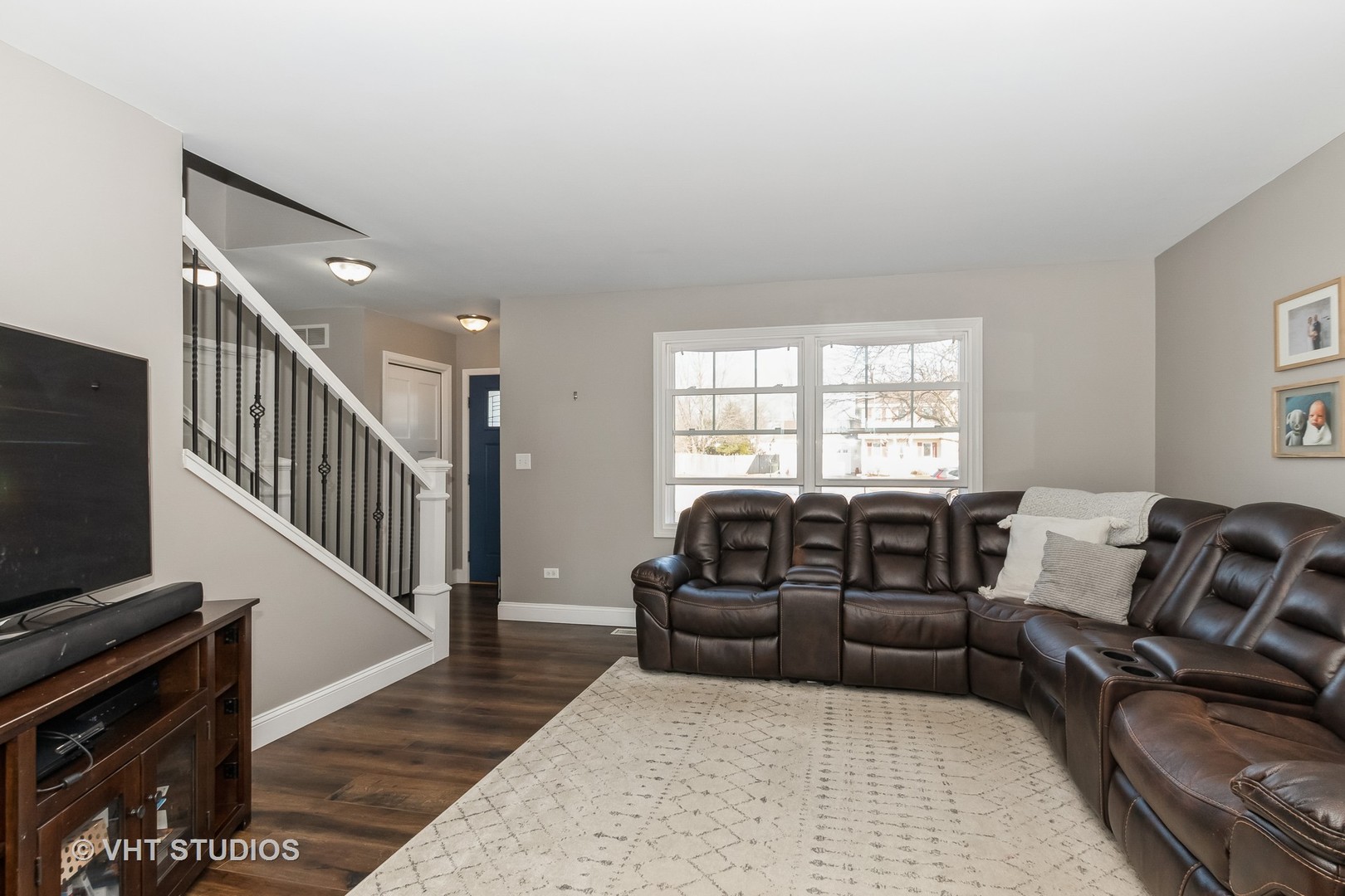 757 Longlane Road New Lenox, IL 60451 - Photo 4 of 16 a living room with furniture and a flat screen tv