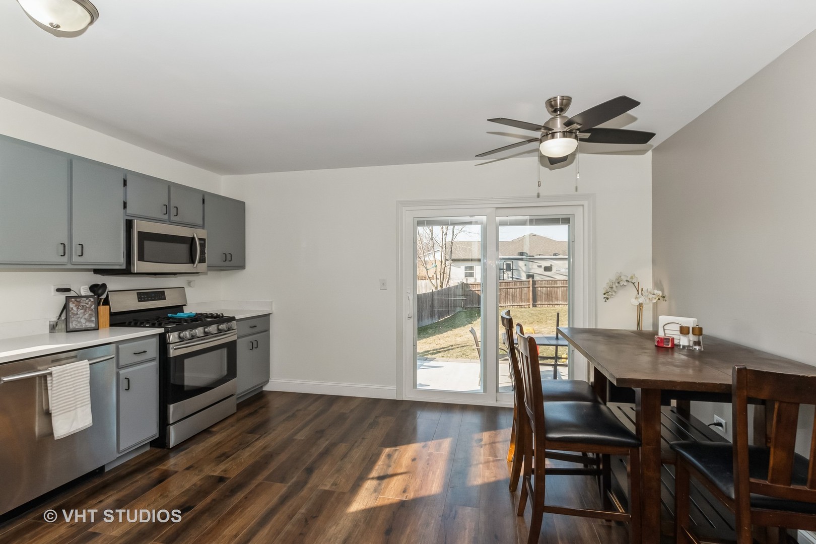 757 Longlane Road New Lenox, IL 60451 - Photo 6 of 16 a view of a dining room with furniture window and wooden floor
