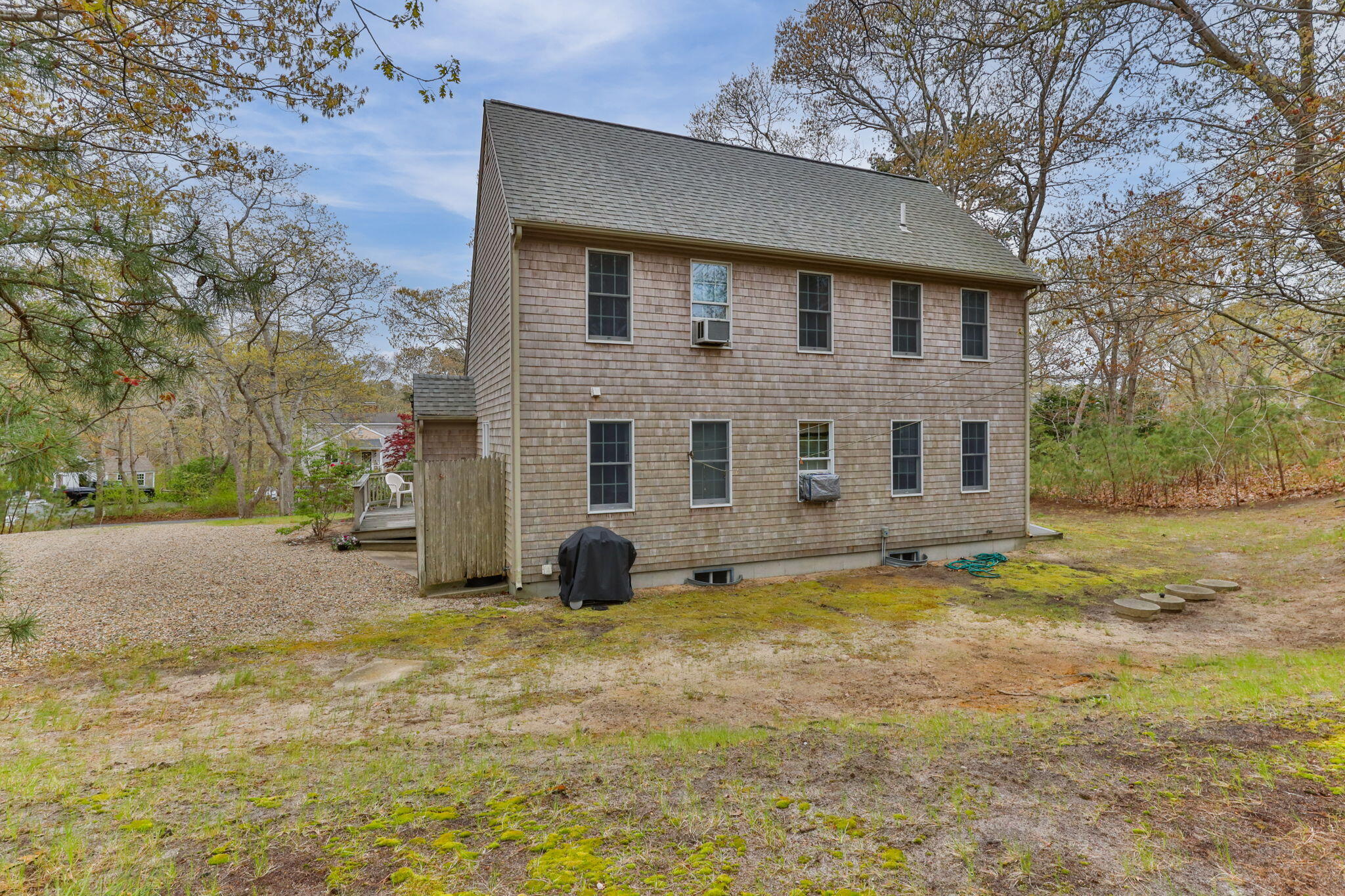 285 Blue Heron Road Wellfleet, MA 02667 - Photo 27 of 31 a view of a house with a yard