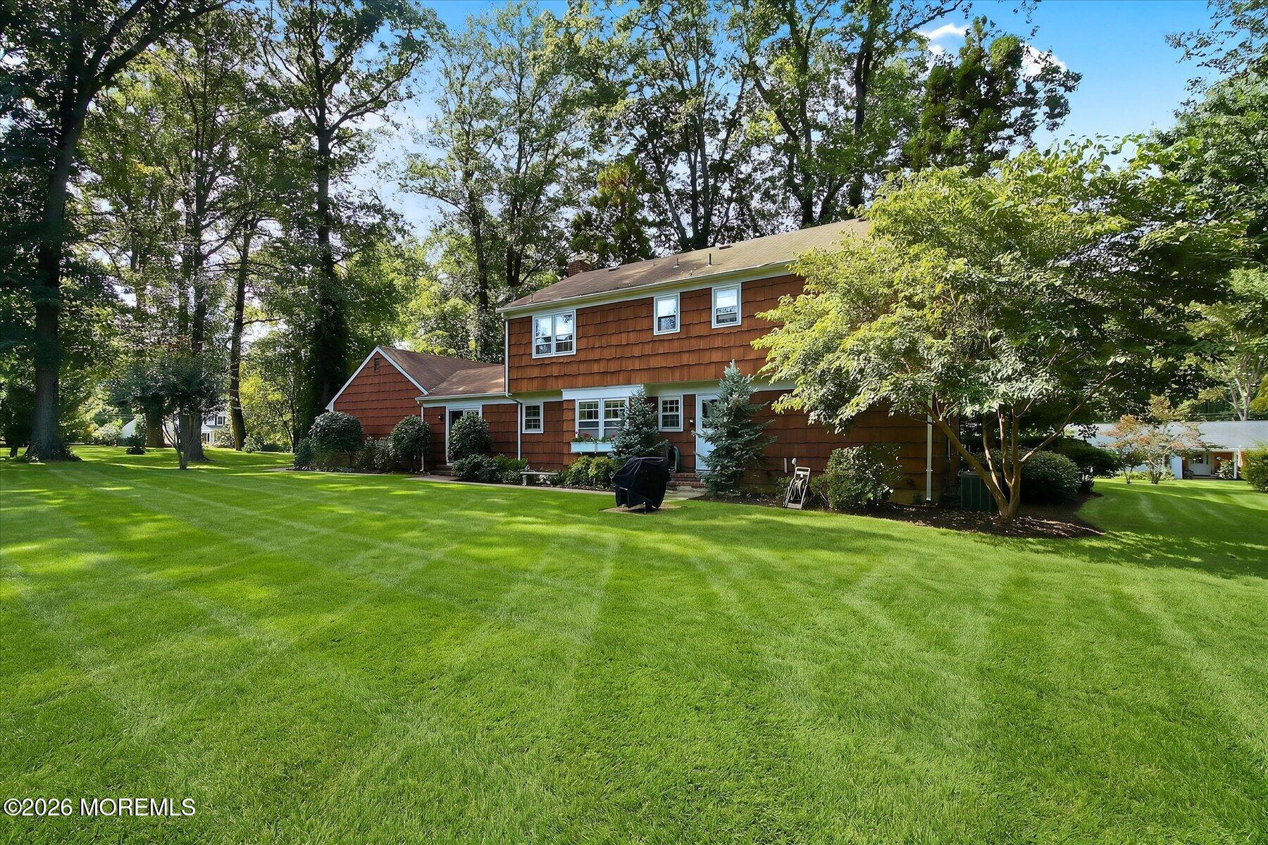 76 Tall Timber Road Middletown, NJ 07748 - Photo 47 of 47 47-Rear Right 1 with grass enhancement