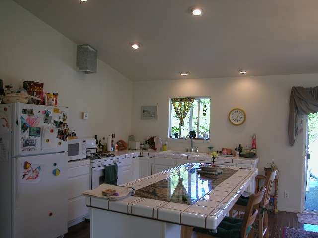 590 Kaupakalua Road Haiku, HI 96708 - Photo 6 of 9 a living room with furniture and a window