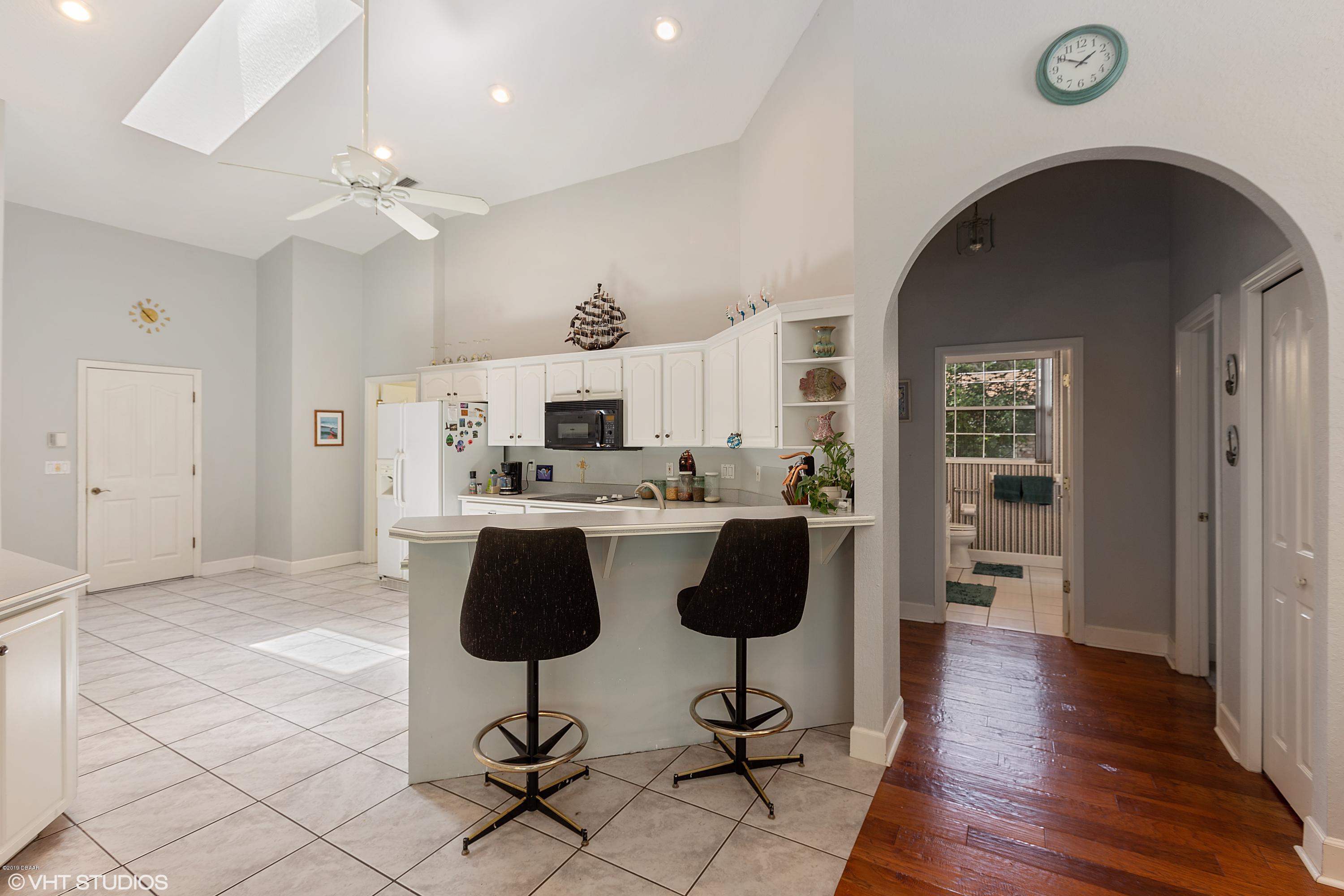 70 Buschman Drive Ponce Inlet, FL 32127 - Photo 13 of 31 Kitchen Breakfast Bar