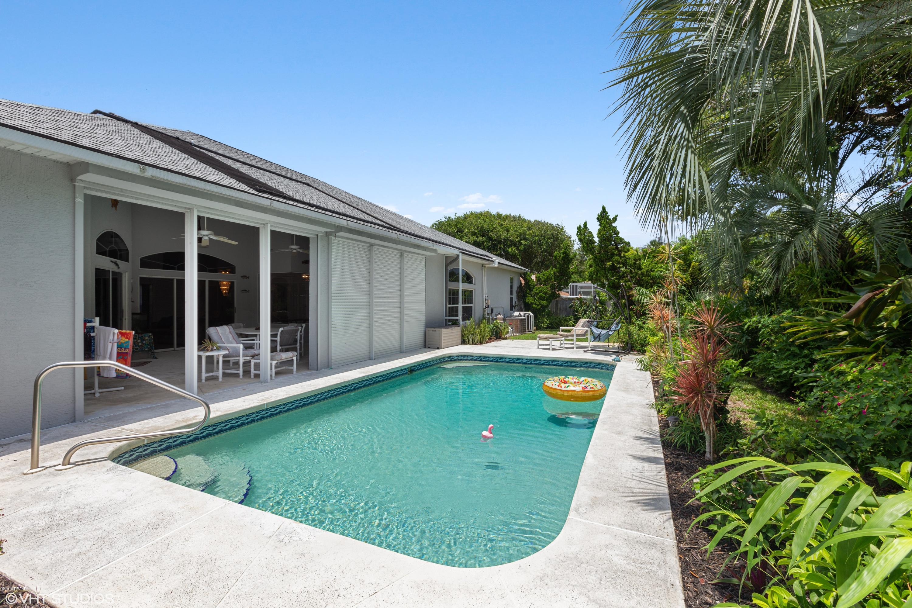 70 Buschman Drive Ponce Inlet, FL 32127 - Photo 22 of 31 Lanai Hurricane Shutters