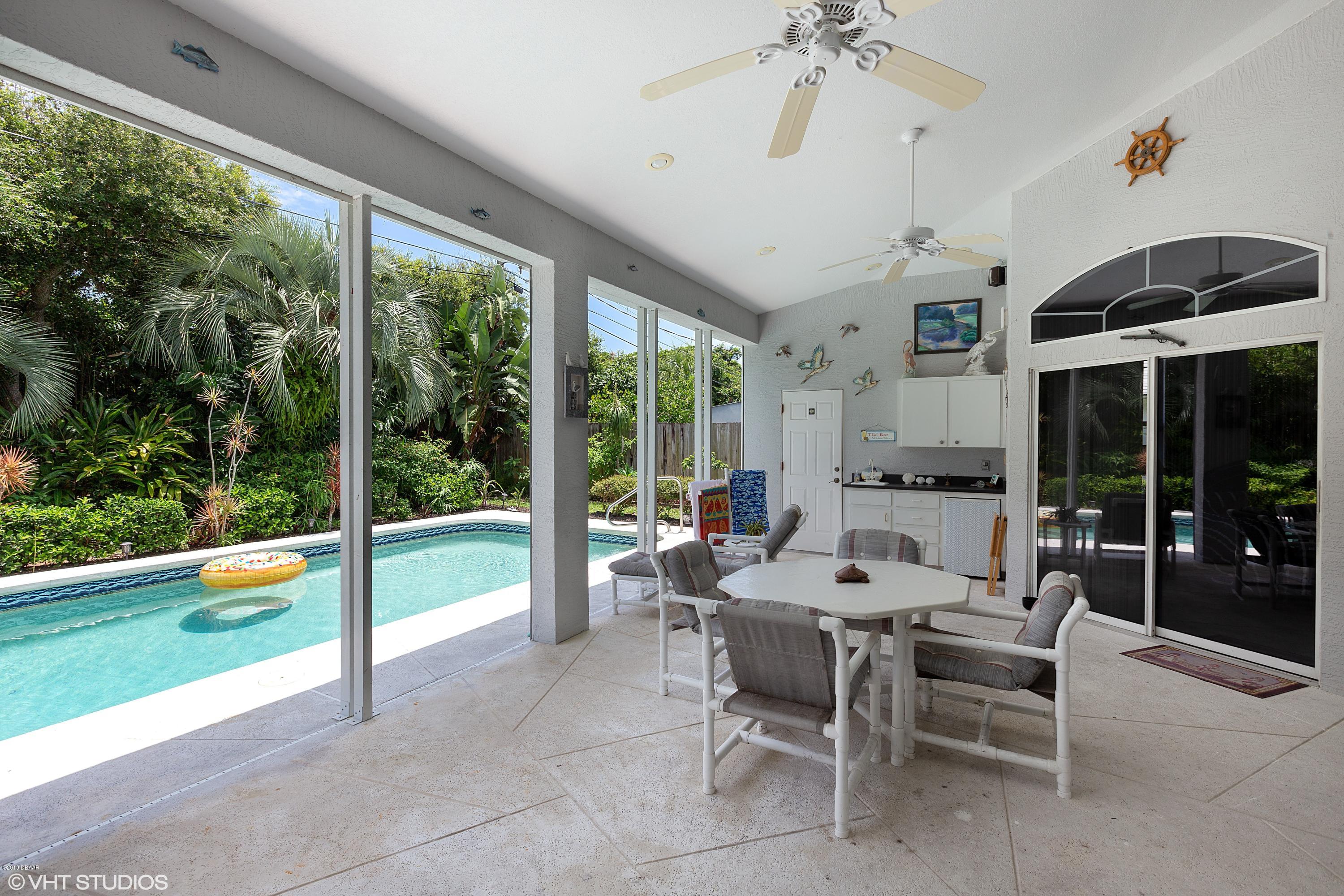 70 Buschman Drive Ponce Inlet, FL 32127 - Photo 4 of 31 Covered Poolside Lanai