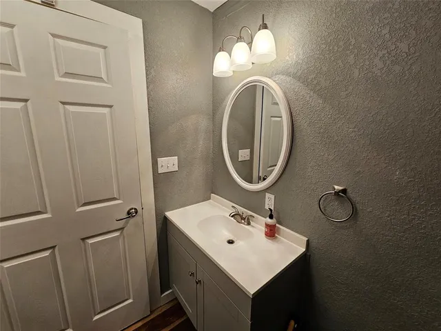 a bathroom with a tub and a shower