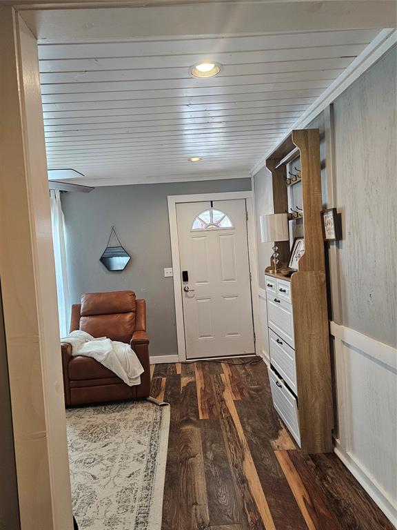 165 Elmwood Road Whitney, TX 76692 - Photo 28 of 28 Entryway featuring dark wood finished floors and recessed lighting