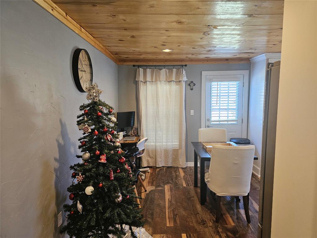 165 Elmwood Road Whitney, TX 76692 - Photo 10 of 28 Office space with dark wood finished floors and wooden ceiling