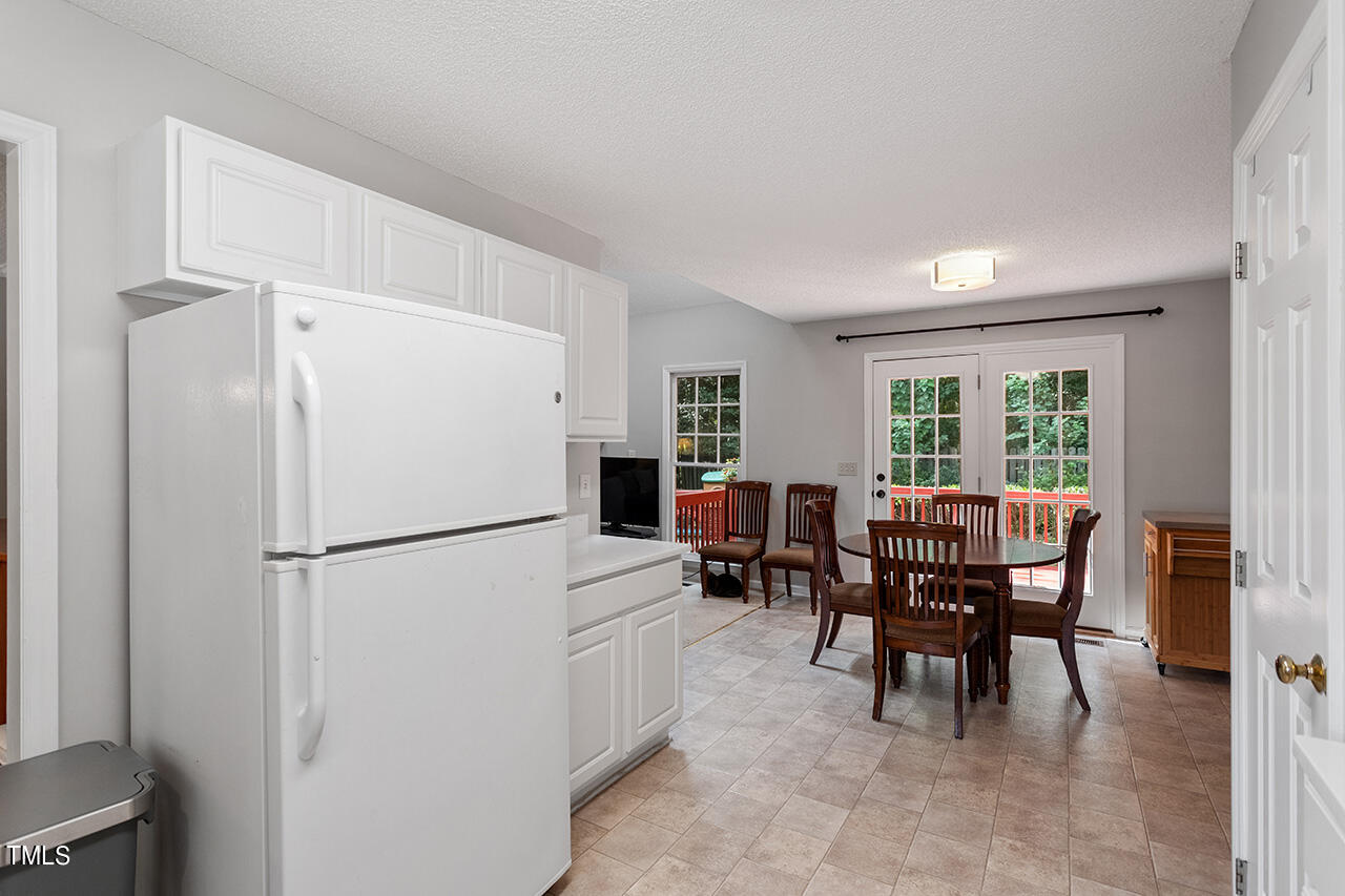 2108 Cedarbluff Court Raleigh, NC 27615 - Photo 11 of 38 a view of dining room with furniture window and outside view