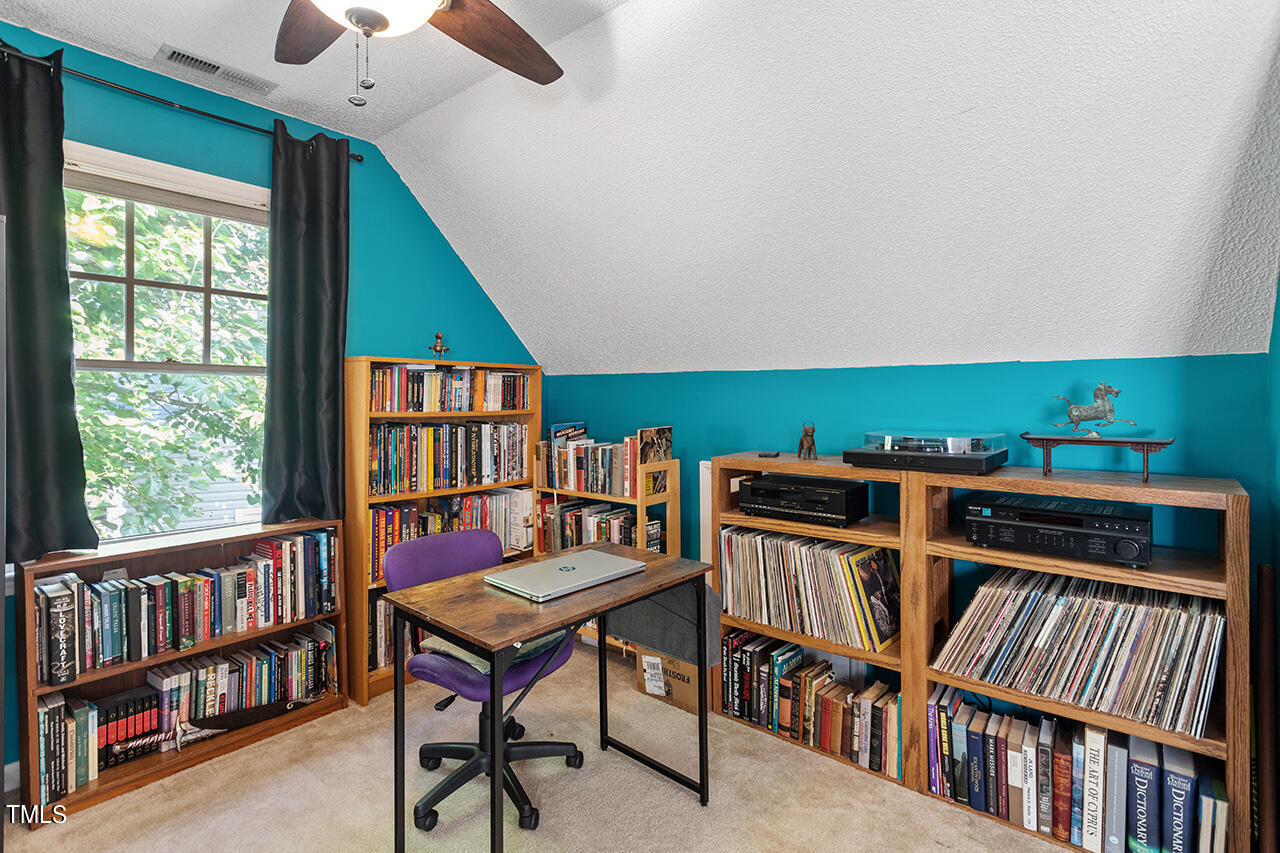 2108 Cedarbluff Court Raleigh, NC 27615 - Photo 30 of 38 a reading room with furniture book shelf and a book shelf