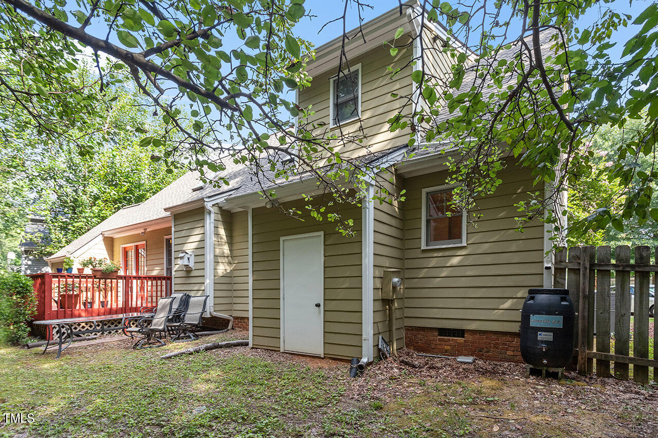 2108 Cedarbluff Court Raleigh, NC 27615 - Photo 34 of 38 a view of a house with a yard