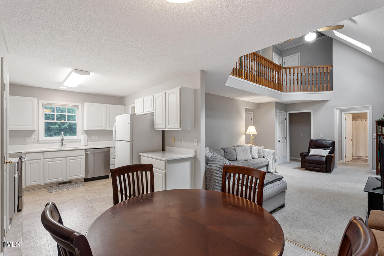 2108 Cedarbluff Court Raleigh, NC 27615 - Photo 7 of 38 a bedroom with furniture and a wooden floor