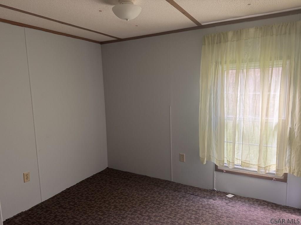 127 1st Street Twin Rocks, PA 15960 - Photo 16 of 20 a view of an empty room with a window