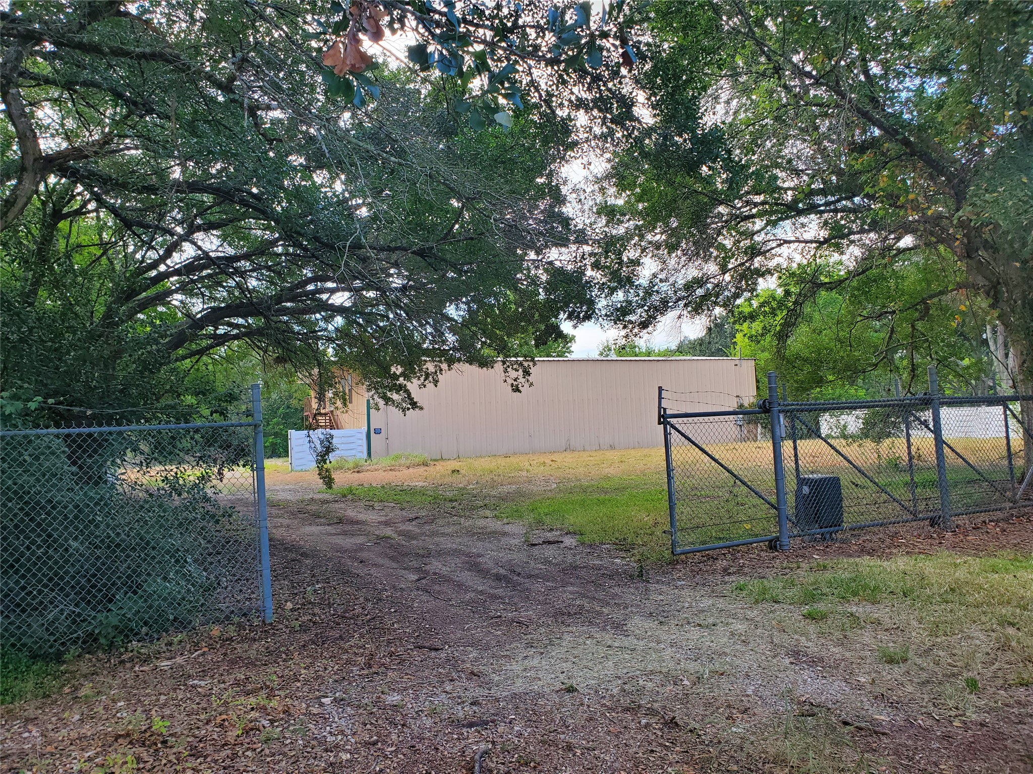 25121 Lakeview Road, Unit A Katy, TX 77494 - Photo 4 of 14 View from Lakeview Road, has electric gate opener