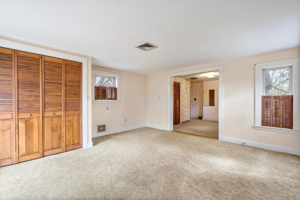 21 Columbus Street Lexington, MA 02421 - Photo 16 of 26 an empty room with windows