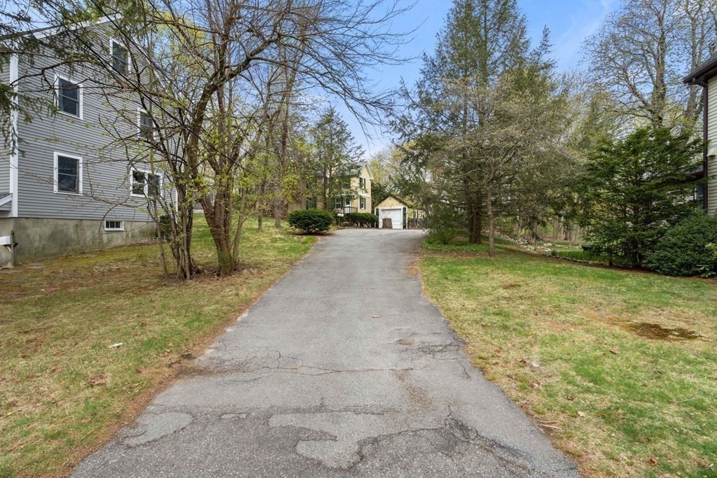 21 Columbus Street Lexington, MA 02421 - Photo 22 of 26 a view of a yard with trees