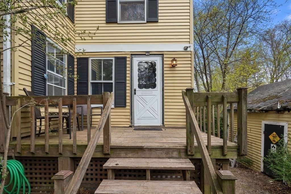 21 Columbus Street Lexington, MA 02421 - Photo 4 of 26 a front view of a house with stairs