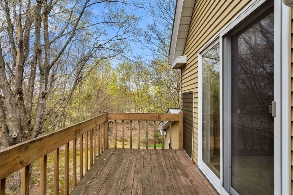 21 Columbus Street Lexington, MA 02421 - Photo 6 of 26 a view of balcony with wooden floor