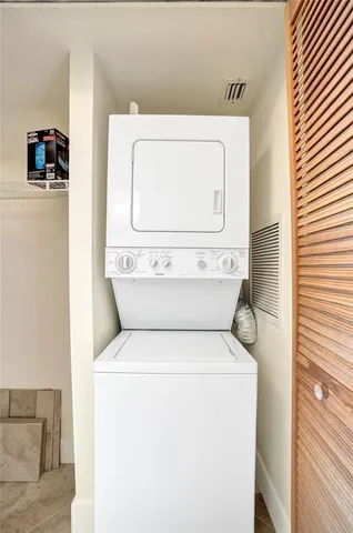 a view of an empty room with stairs