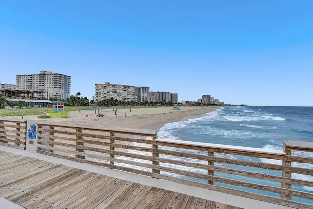 a view of city with ocean