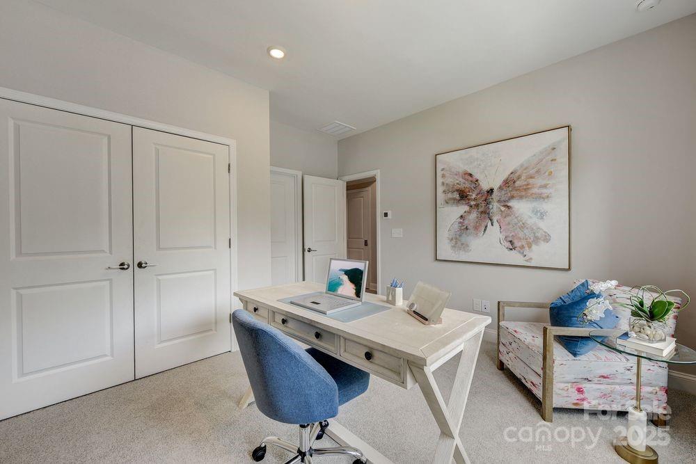 729 Hoke Lane Davidson, NC 28036 - Photo 16 of 29 a living room with furniture and a table