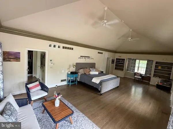 a bathroom with a toilet a sink and a shower