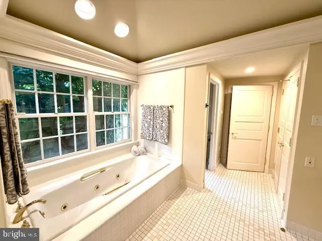 a view of a house with swimming pool and porch