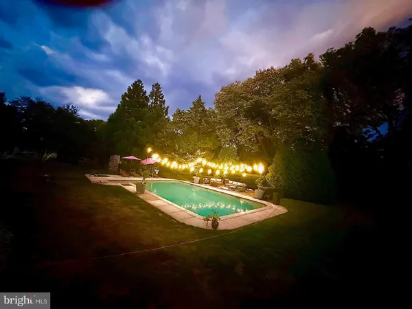 a living room with furniture fireplace and a flat screen tv
