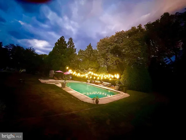 a living room with furniture fireplace and a flat screen tv