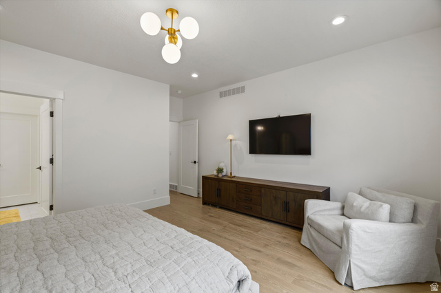 3349 Oxford Loop Morgan, UT 84050 - Photo 17 of 47 Bedroom with light wood-type flooring and recessed lighting