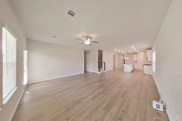 a view of a livingroom with a hardwood floor