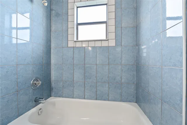 a bathroom with a bathtub