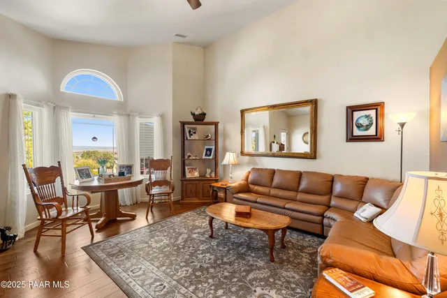 a living room with furniture or couch and a flat screen tv