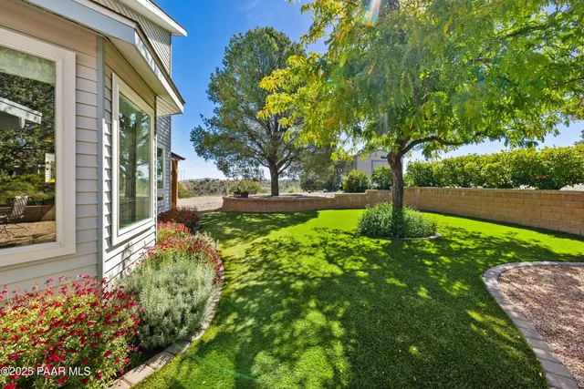 a view of a road with a building in the background