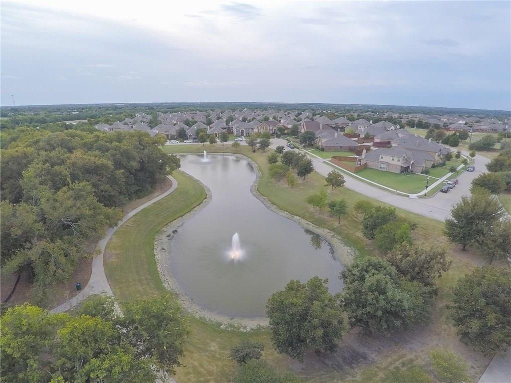 204 Dancing Light Lane Red Oak, TX 75154 - Photo 18 of 21 an aerial view of a house with a yard and lake view