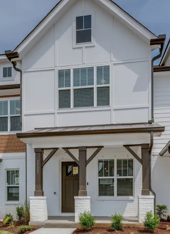 a front view of a building with a balcony